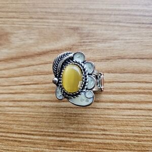 Ring with adjustable band